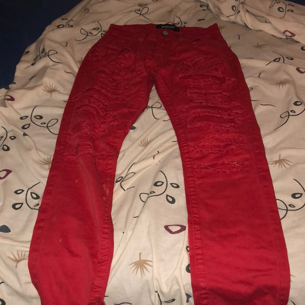 men’s red distressed jeans